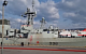 Члены Компартии Греции облили красной краской корабль НАТО в порту Пирей
